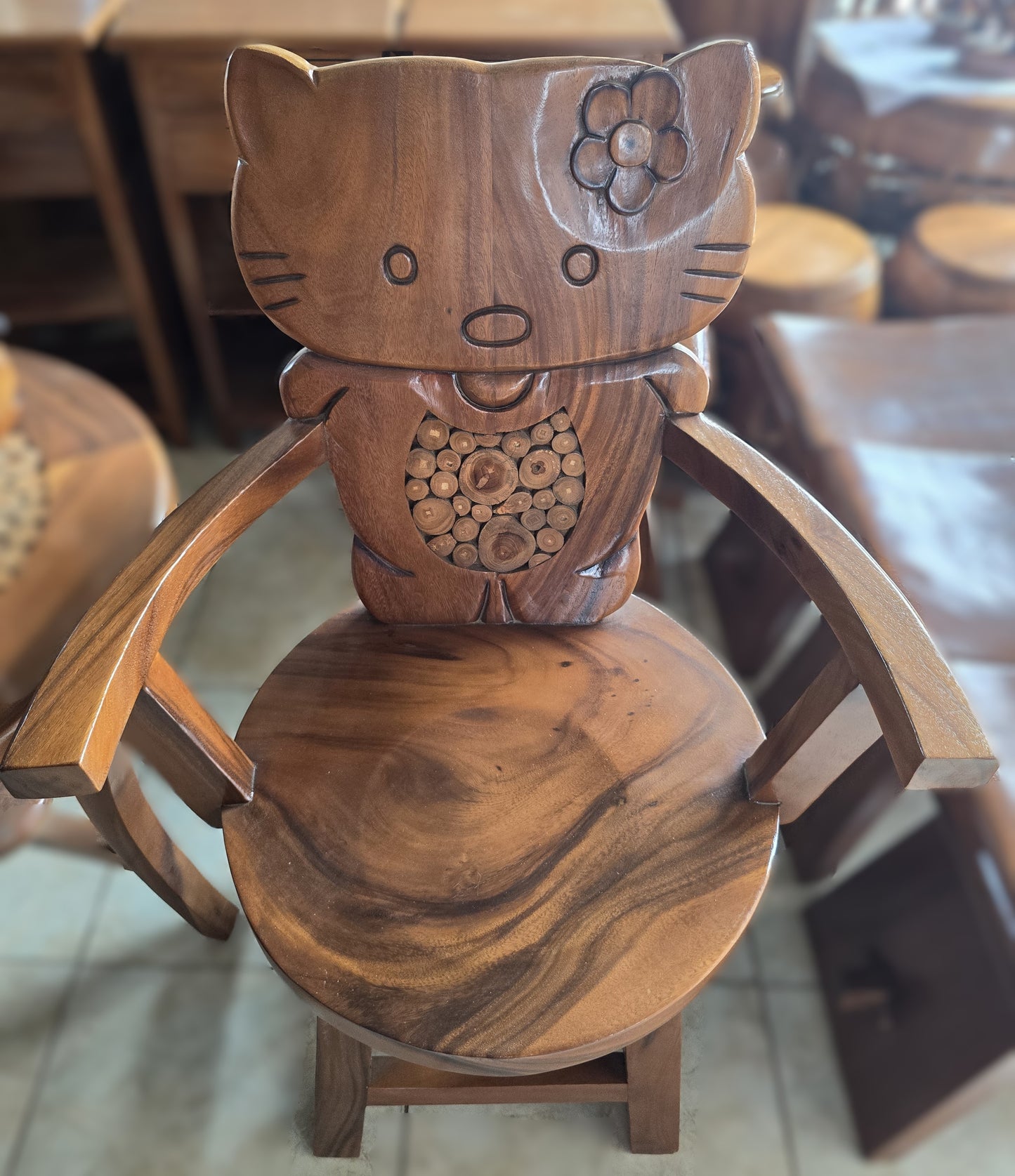 Fancy chair in teak wood