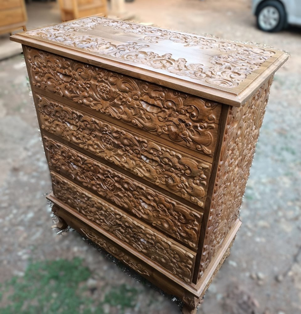 Carved teak wood chest of drawers