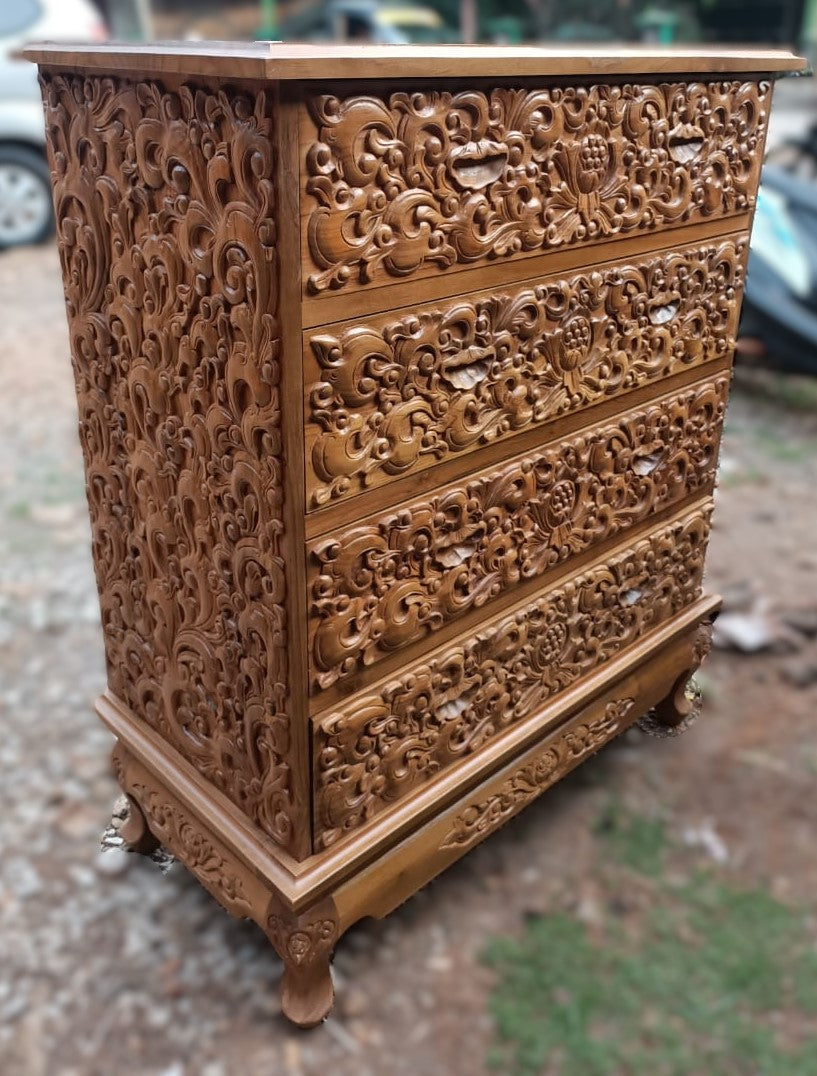 Carved teak wood chest of drawers